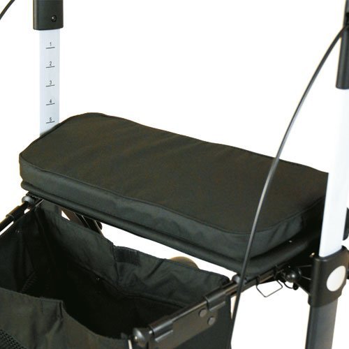 Närbild på en svart, vadderad fast sits med avtagbar kudde placerad på en rollator