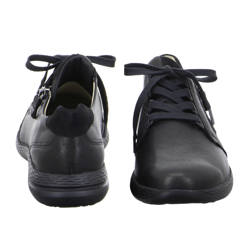 Två svarta Fidelio damsneakers i läder, en sedd framifrån och en bakifrån