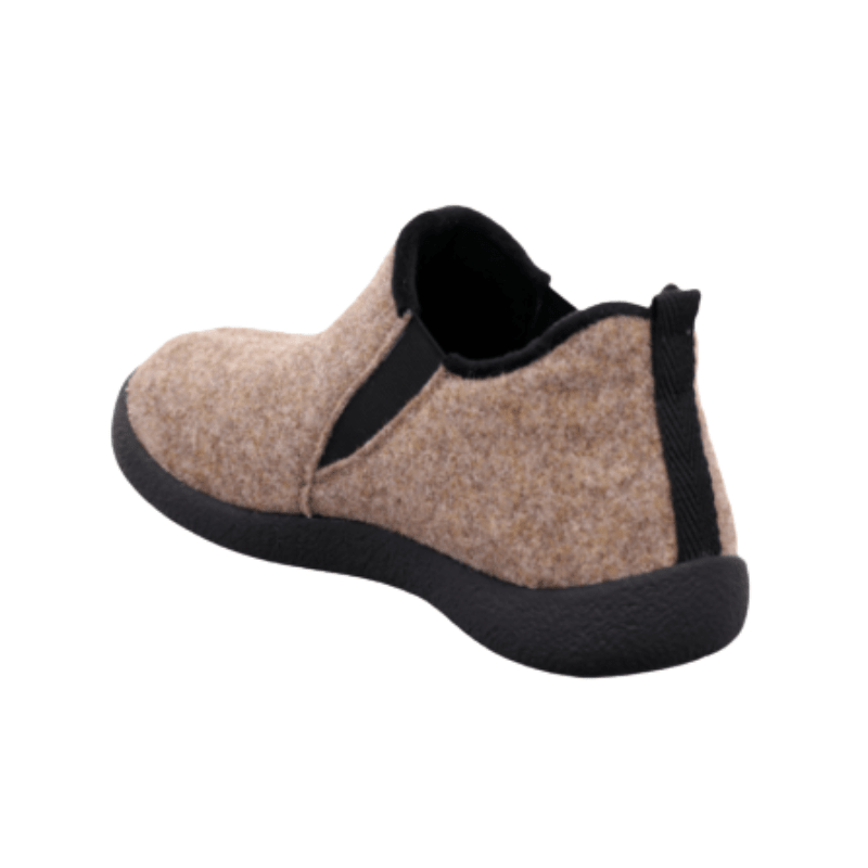Beige Rohde damtoffel i textil sedd snett bakifrån, med detaljer av den svarta sulan