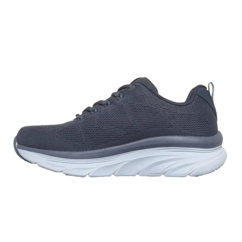 Enkel duvblå Skechers damsneaker i mjukt mesh från sidan med snörning och tjock grå sula