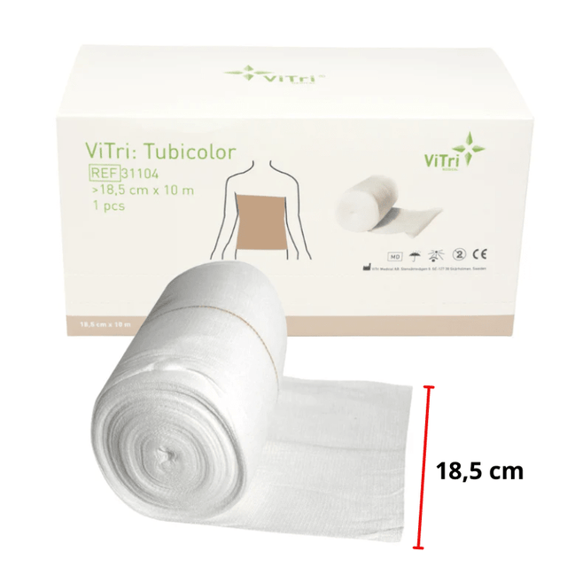 Hvid elastisk tubebandage til overkrop på rulle, delvist rullet ud, med emballage og bredde på 18,5 cm