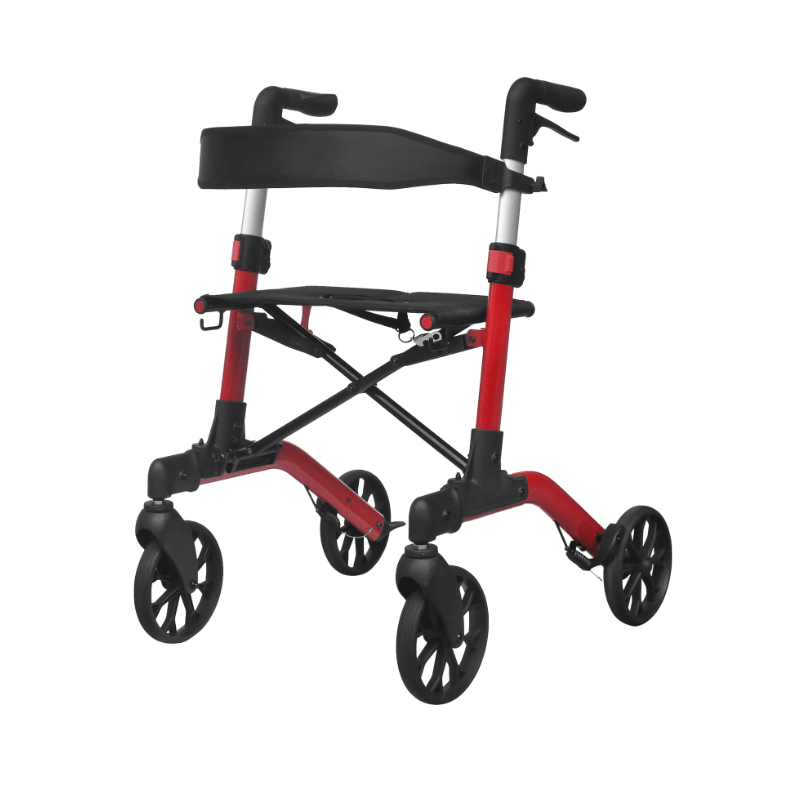 Röd Mambo rollator sedd snett framifrån, med svart sits och synlig ram utan väska