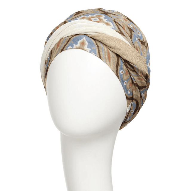 Shakti turban i mjuk bambusviskos med ett brett mönstrat pannband, visad på skyltdocka framifrån