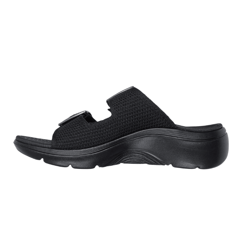 Svart Skechers damtoffel i stickat material med justerbara remmar, sedd från den inre sidan