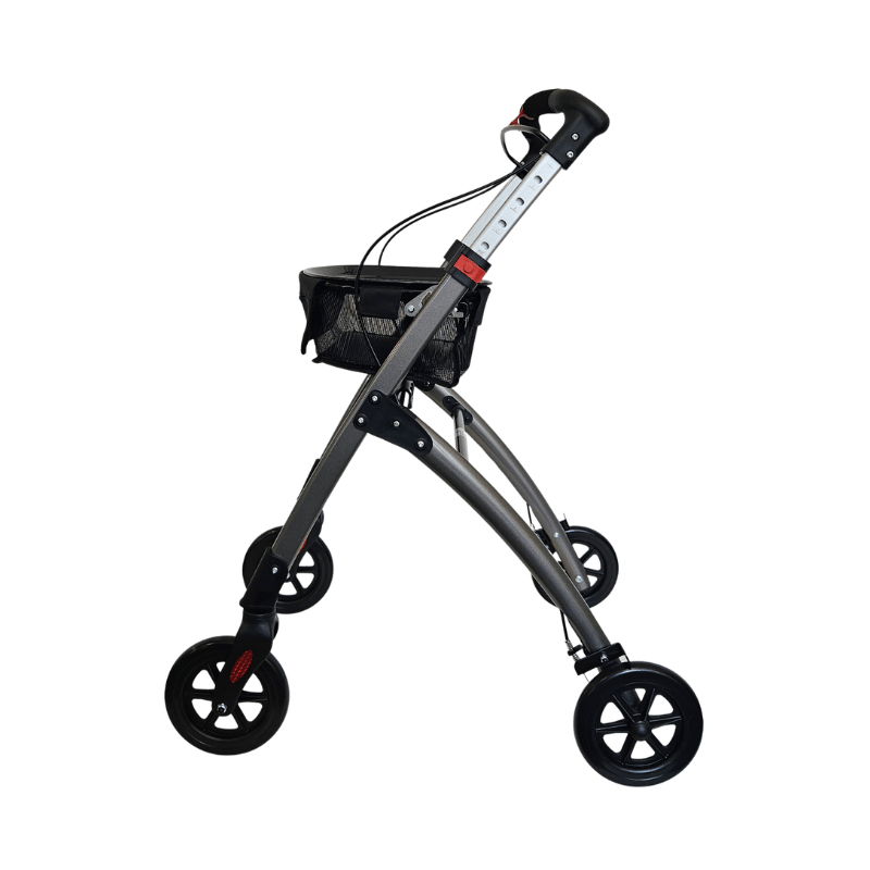 Robin indendørs rollator i antracitgrå set fra siden, med kurv og bakke på plads