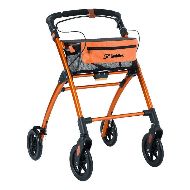 Orange Jaguar inomhusrullator sedd snett framifrån med svart nätkorg och orange väska med dragkedja