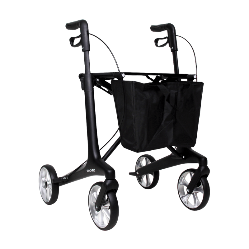 Svart Oscar kolfiber rollator med en praktisk nätkasse framifrån, redo för utomhusbruk