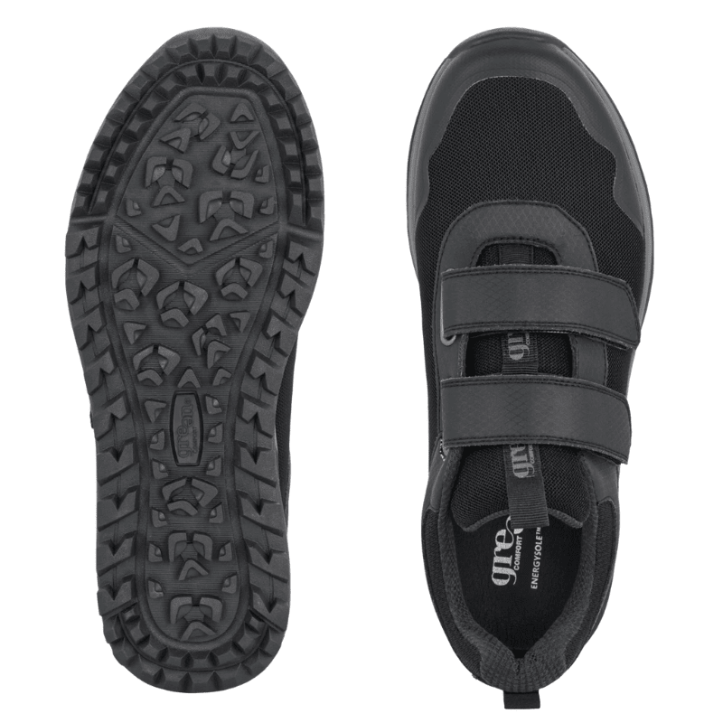 Två svarta Green Comfort herrsneakers uppifrån, en visar yttersulan och den andra ovansidan med kardborre