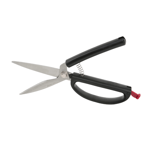 Självöppnande kökssax med svarta handtag och silverfärgade blad, öppen med synlig fjäder