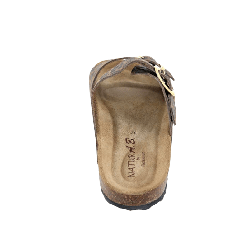 Innersulan på Relaxshoe damtoffel med mjukt brunt mocka, synligt fotvalvsstöd och Relaxshoe-logotyp