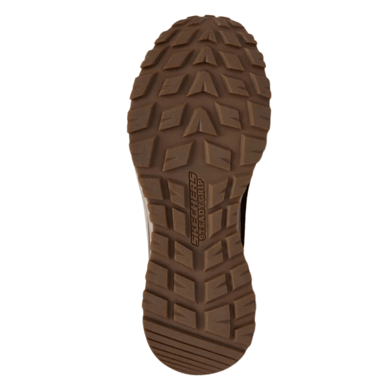 Undersidan av sulan på en brun Skechers outdoor känga för herrar, med tydligt mönster för grepp