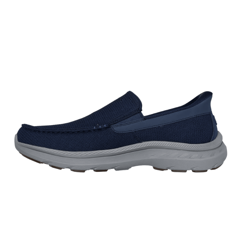 Mörkblå Skechers herrsko med slip-in-design i ventilerande mesh, från sidan, med grå yttersula