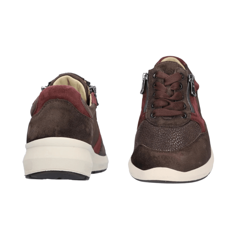 Två mörkbruna Waldläufer damsneakers, en sedd framifrån med snörning och dragkedjor, en sedd bakifrån