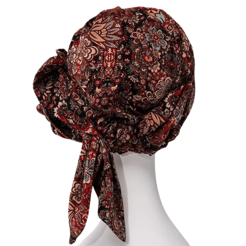 Juvela turban Floral Folklore på mannekäng, sedd bakifrån med blommigt mönster och volym