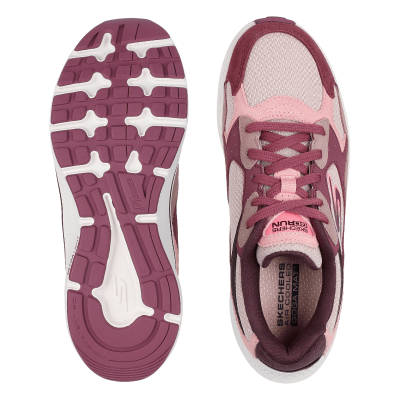 Ett par rosa Skechers damsneakers, en sedd ovanifrån med innersula och en med yttersulan uppåt