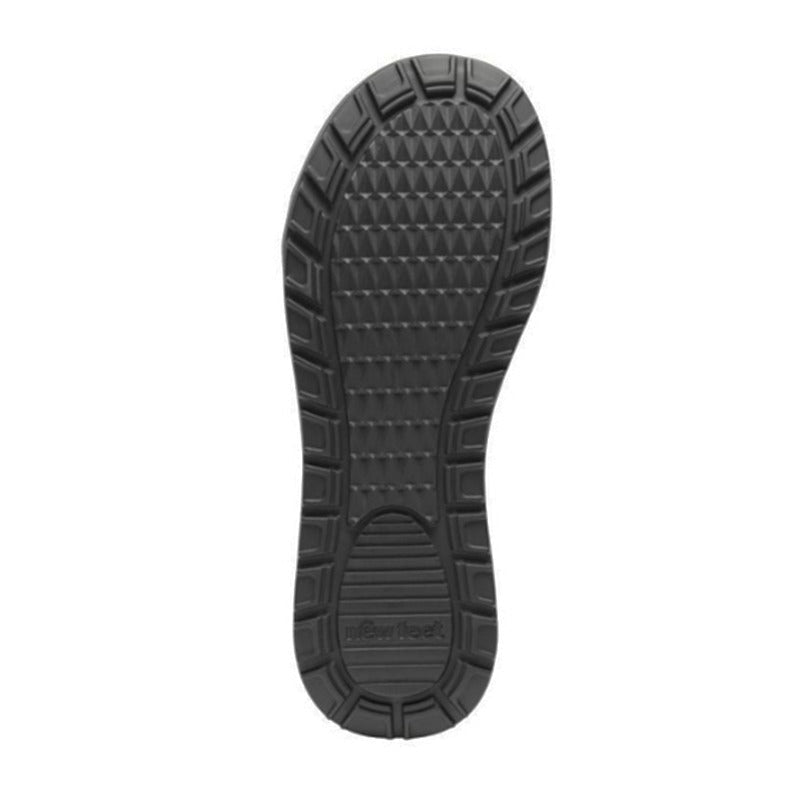 Svart sula från en New Feet damkänga, sedd underifrån, med tydligt mönster för bra grepp