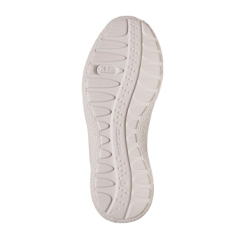 Den vita, mönstrade yttersulan på en Hartjes damsneaker med logotyp