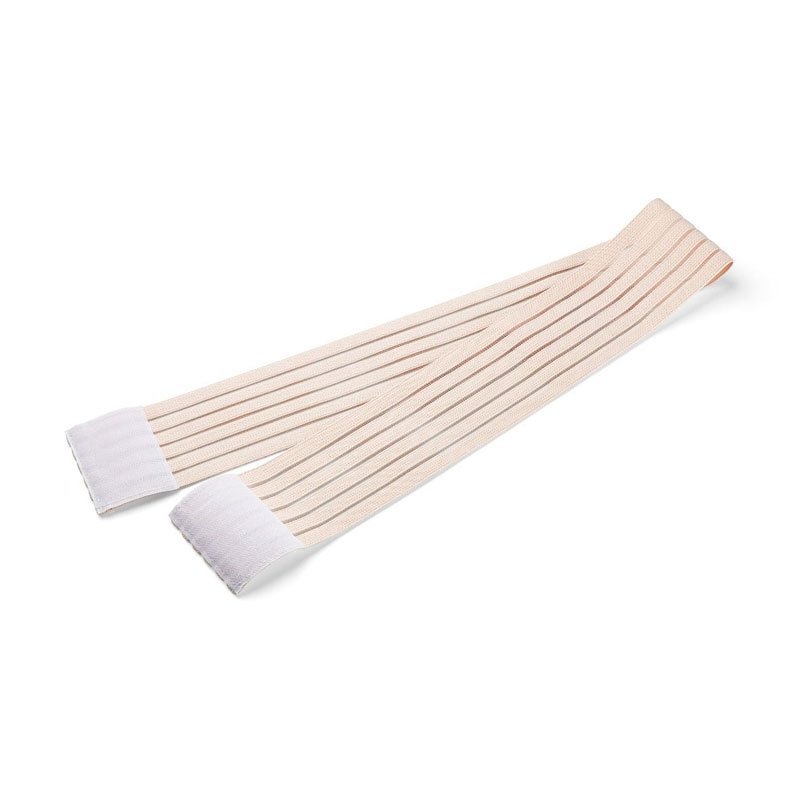 Helt utrullat beige elastiskt stödbandage med kardborrefästen i båda ändar