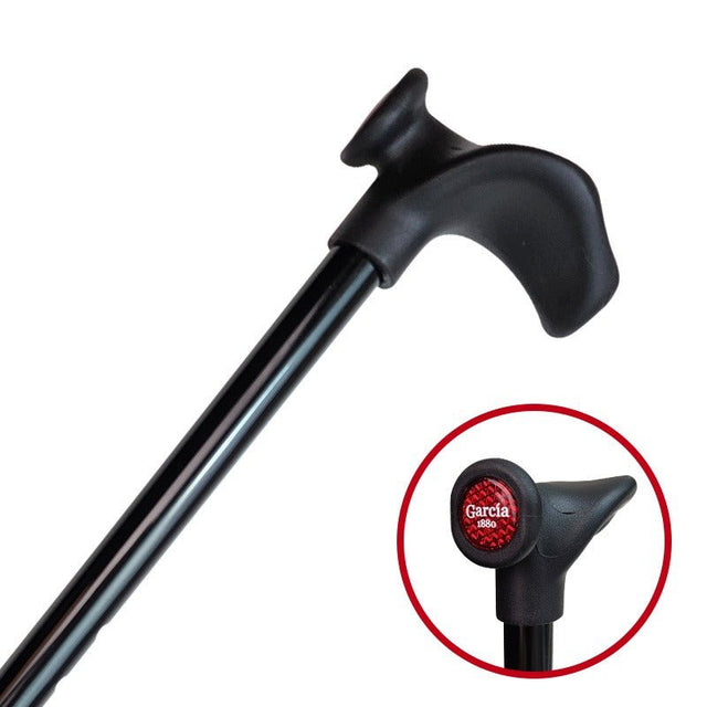 Svart justerbar käpp med ergonomiskt handtag för höger hand, detalj av röd reflex