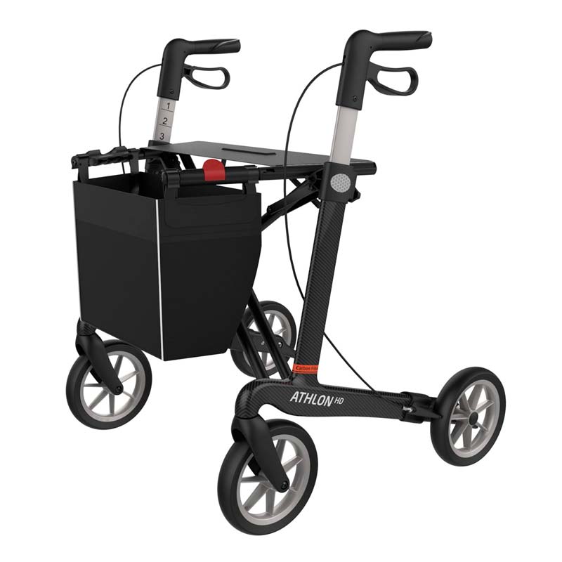 Athlon HD rollator i kolfiber, sedd snett framifrån, visar den breda sitsen och de stora hjulen