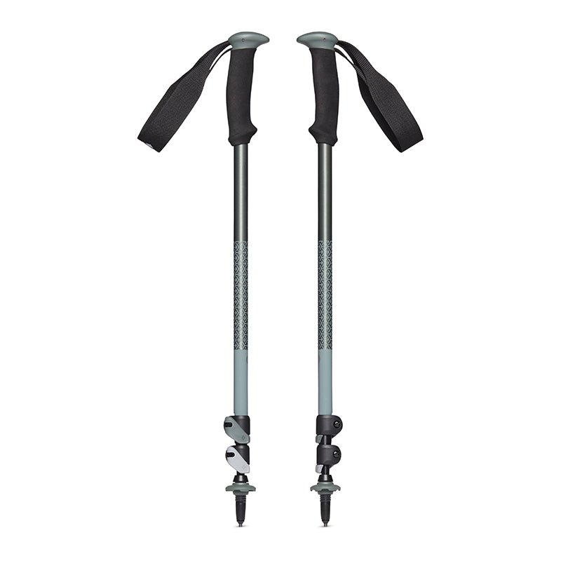 Två gröna Black Diamond Trail Sport vandringsstavar med svarta handtag och FlickLock®-system
