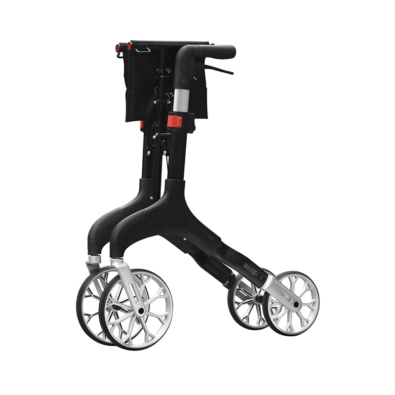 Kompakt sort Manhattan udendørs rollator set skråt bagfra i foldet tilstand