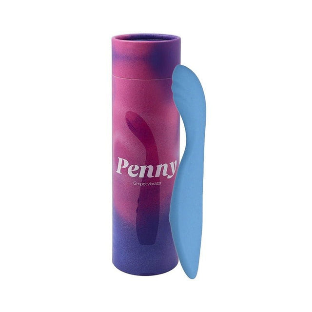 Blå Penny vibrator i silikon bredvid sin lila och rosa förpackning med texten Penny