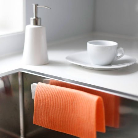 Disktrasehållare med sugpropp