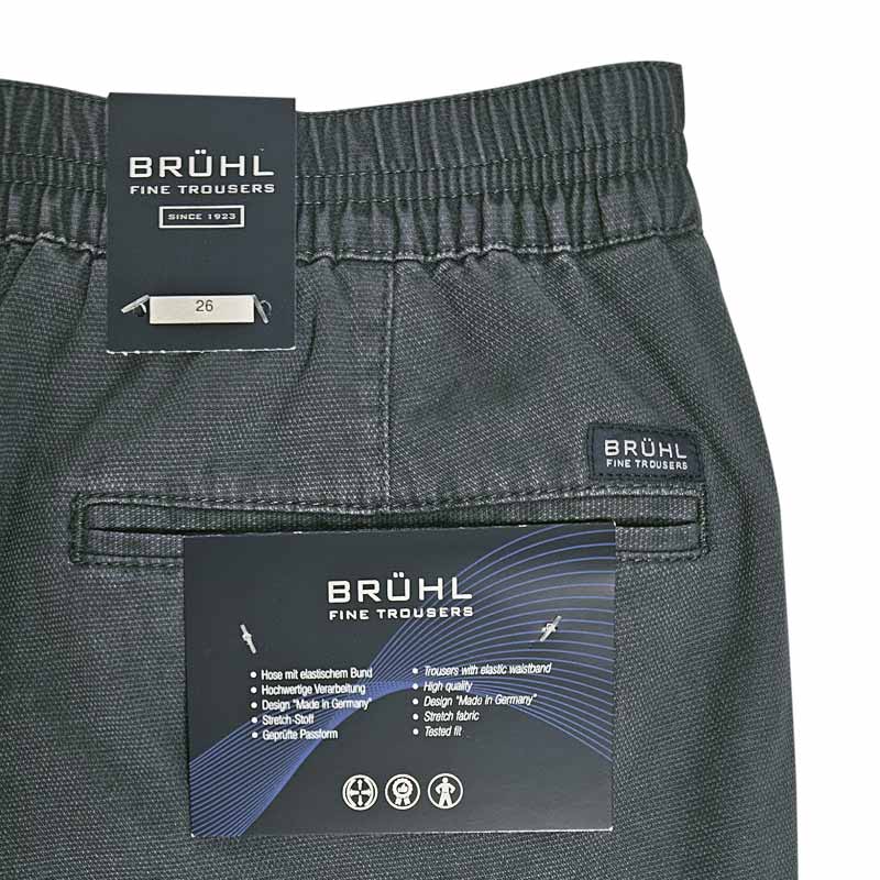Närbild på Brühl shorts i gråblå bomull med struktur, visar den breda elastiska midjan och fickdetaljer