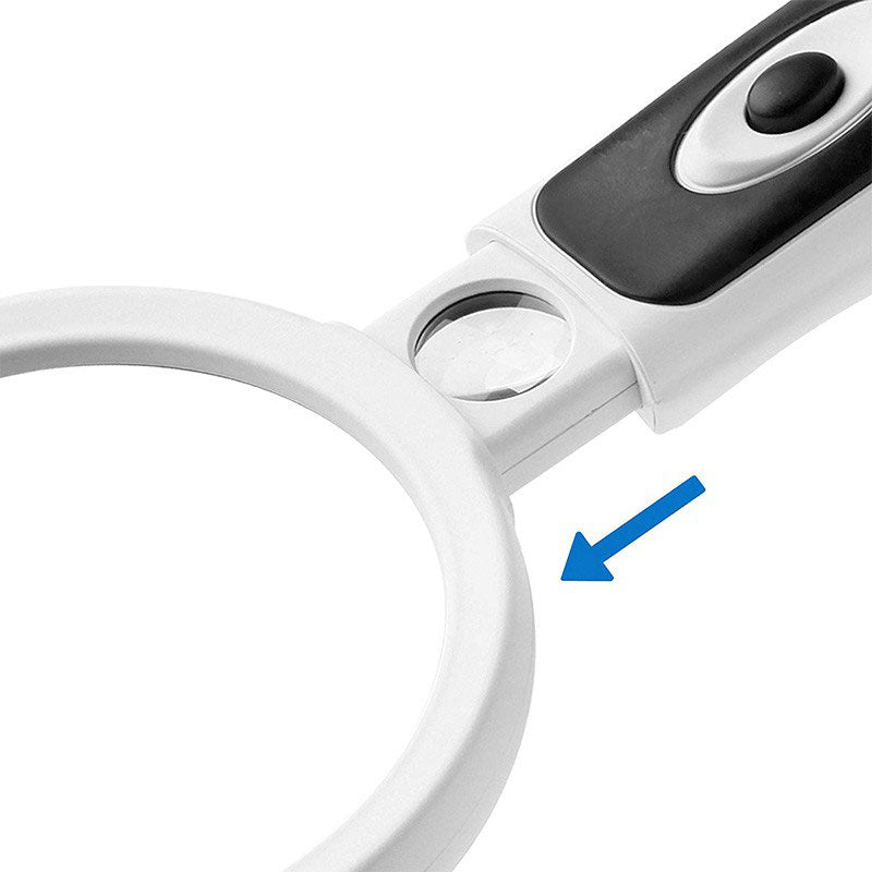 Närbild på läsluppens handtag med en blå pil som visar den dolda spotlinsen