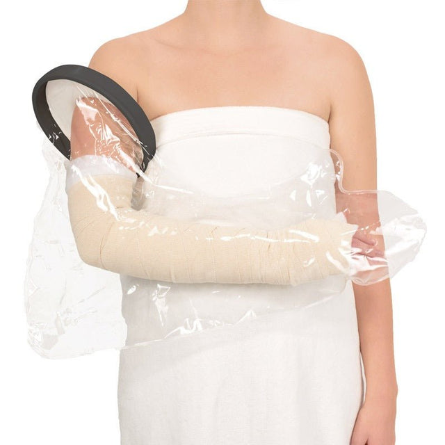 Transparent duschskydd för hel arm med svart ring och silikonmembran, används över ett bandage på en arm