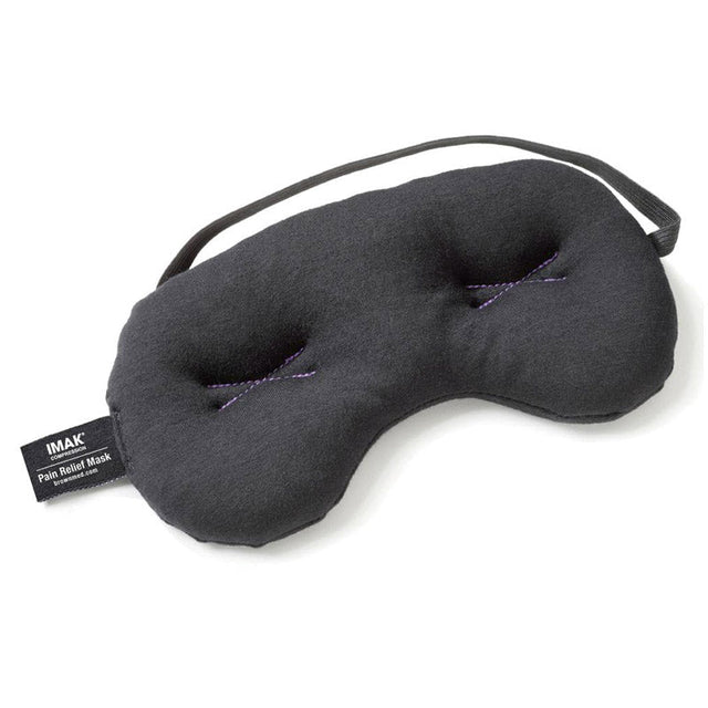 Sort IMAK sovemaske med lilla krydssting og elastik, set forfra på hvid baggrund