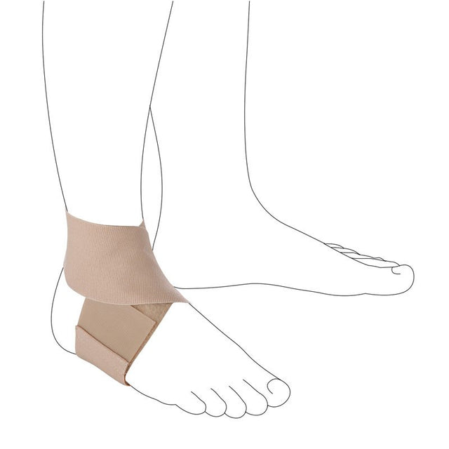 Beige elastiskt fotledsstöd lindat som en åtta runt en fot, fäst med kardborreband