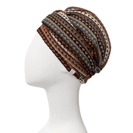 Sapphire Boho turban i Autumn Lace design, sedd från sidan på en skyltdocka, med stickat mönster i varma höstfärger