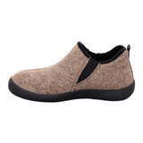 Beige Rohde damtoffel i textil med svart sula och elastiska band, sedd från sidan