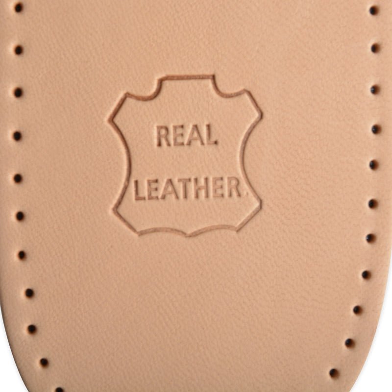 Framfotsinlägg med integrerad t-pelott